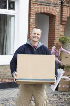 Organised household storage space in Stokenewington with boxes and home items
