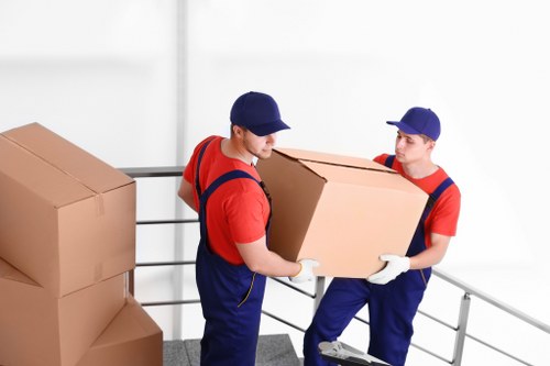 Team reviewing health and safety procedures in a storage environment
