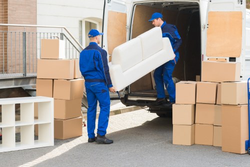 Staff at Stokenewington Storage following safety procedures in a storage area