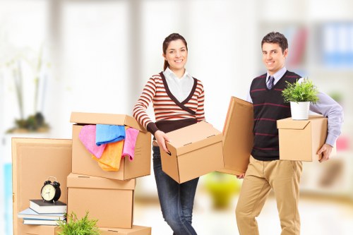 House removal team packing furniture in Stokenewington