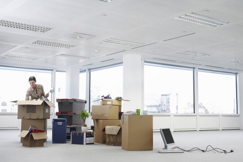 Recycling bins and sorted materials inside a storage facility