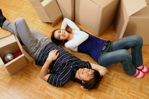 Packed boxes and moving equipment ready for Stokenewington removals